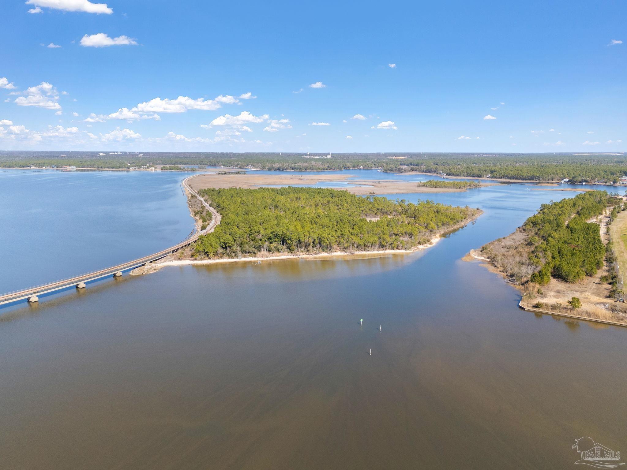 Island Del Monte Street Milton, FL 32583 - Photo 1 of 12 a view of an ocean and beach