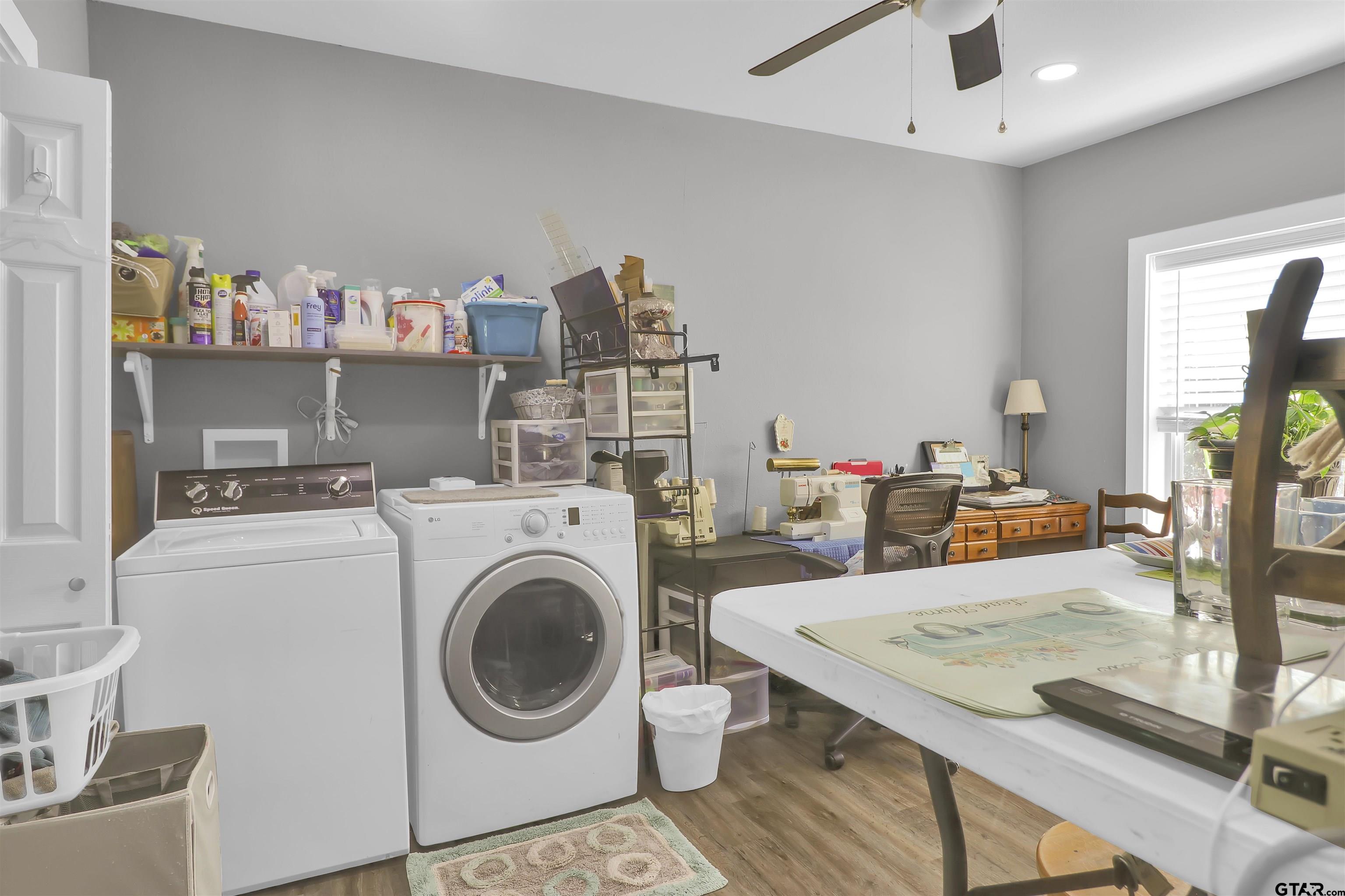 554 East San Antonio Street Alto, TX 75925 - Photo 18 of 28 a view of kitchen and living room with a sink