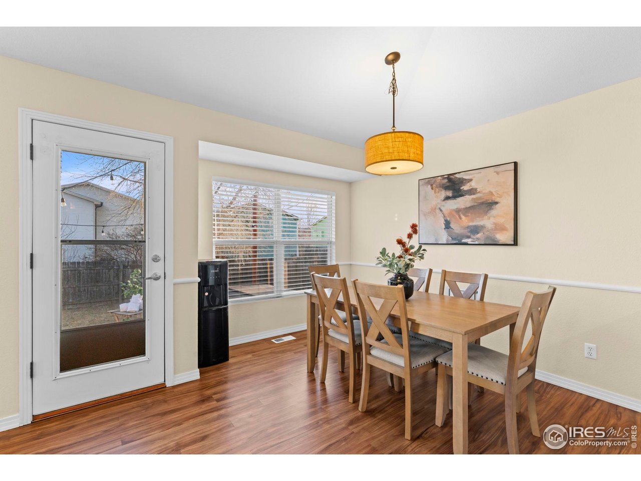 628 Sumac Street Frederick, CO 80530 - Photo 9 of 19 Dining Room to Backyard