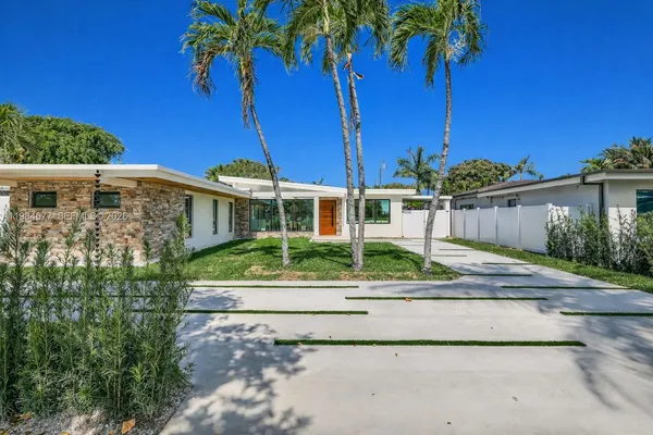 front view of a house with a small yard