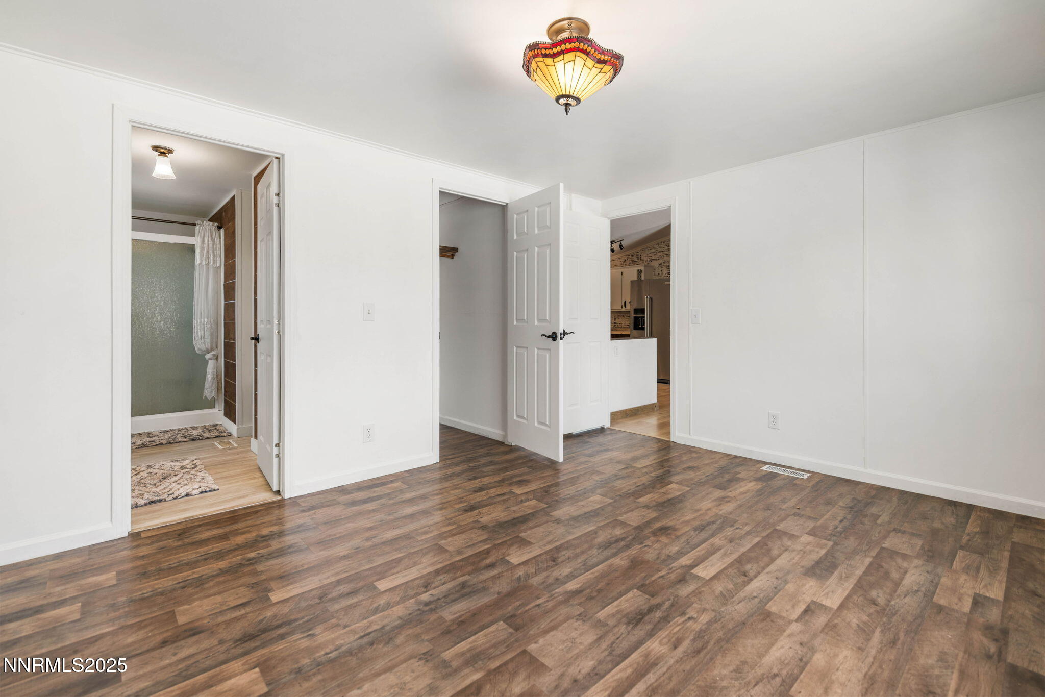 1535 Topaz Ranch Drive Topaz Ranch Estates, NV 89444 - Photo 12 of 38 a view of an empty room and wooden floor