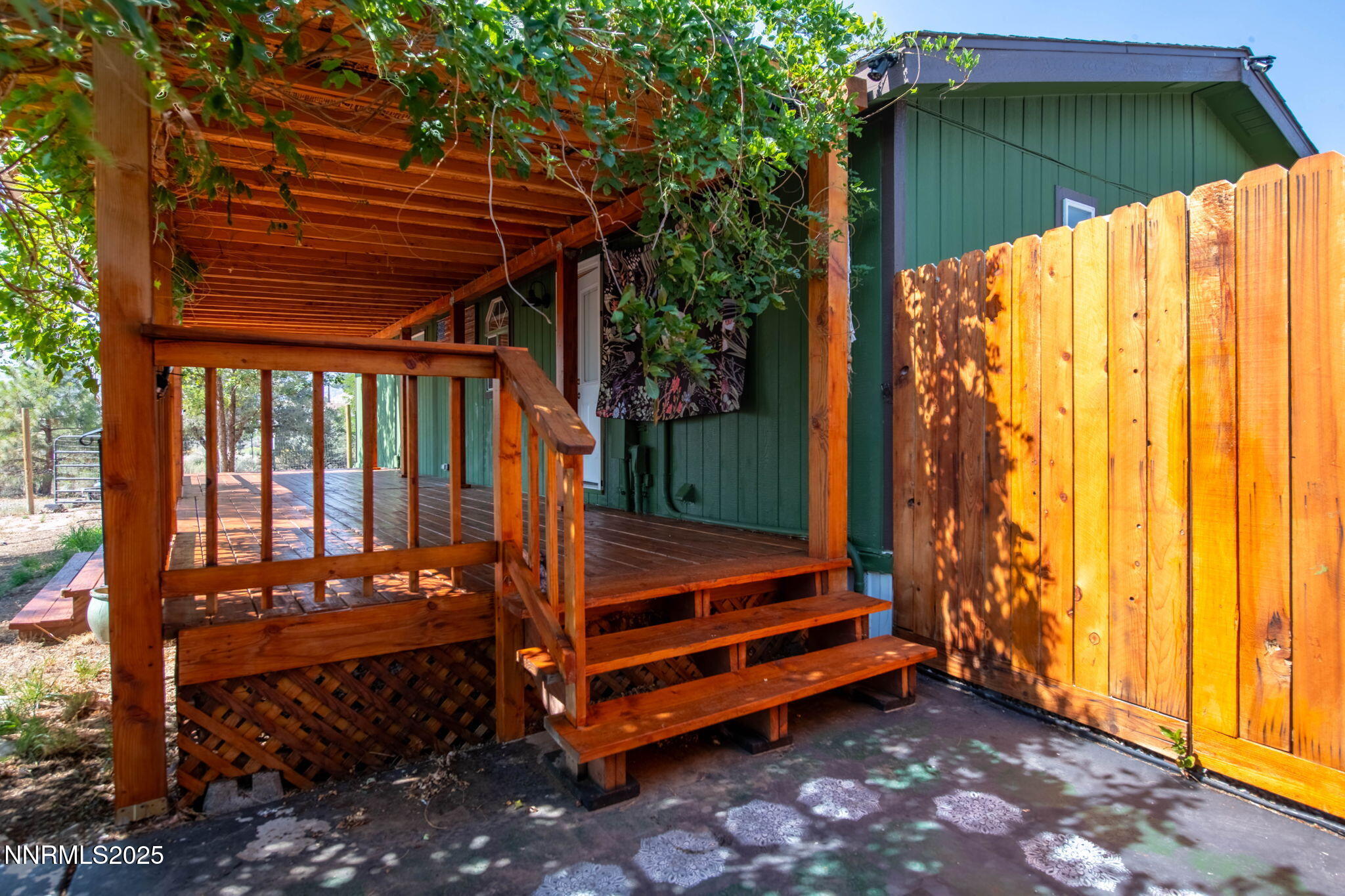 1535 Topaz Ranch Drive Topaz Ranch Estates, NV 89444 - Photo 21 of 38 a blue bench sitting in front of a house