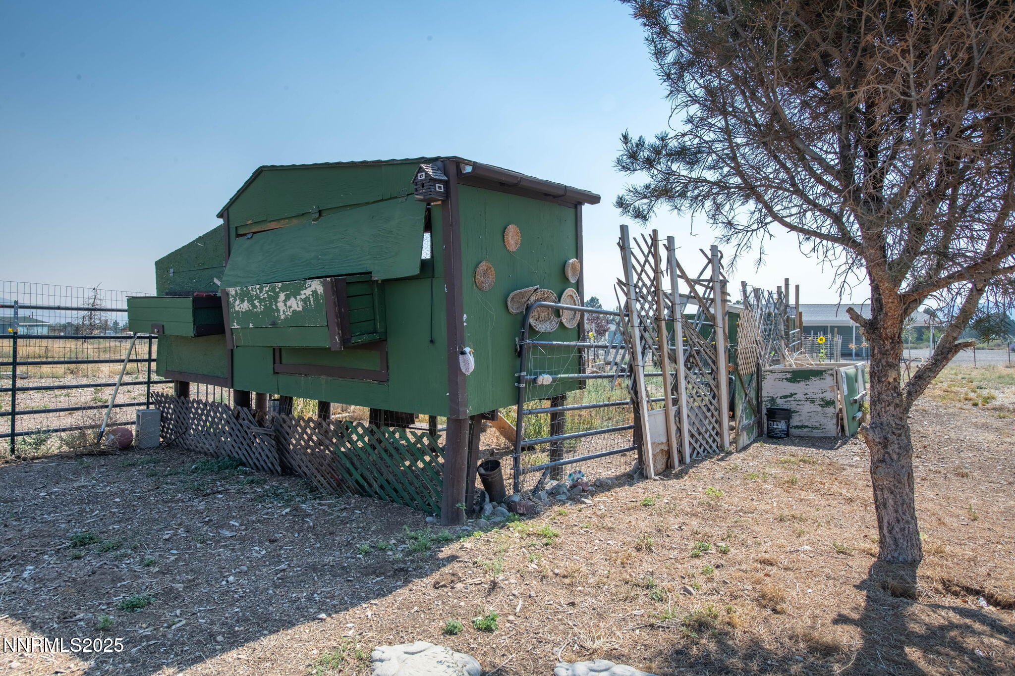 1535 Topaz Ranch Drive Topaz Ranch Estates, NV 89444 - Photo 28 of 38 a front view of a house with a yard