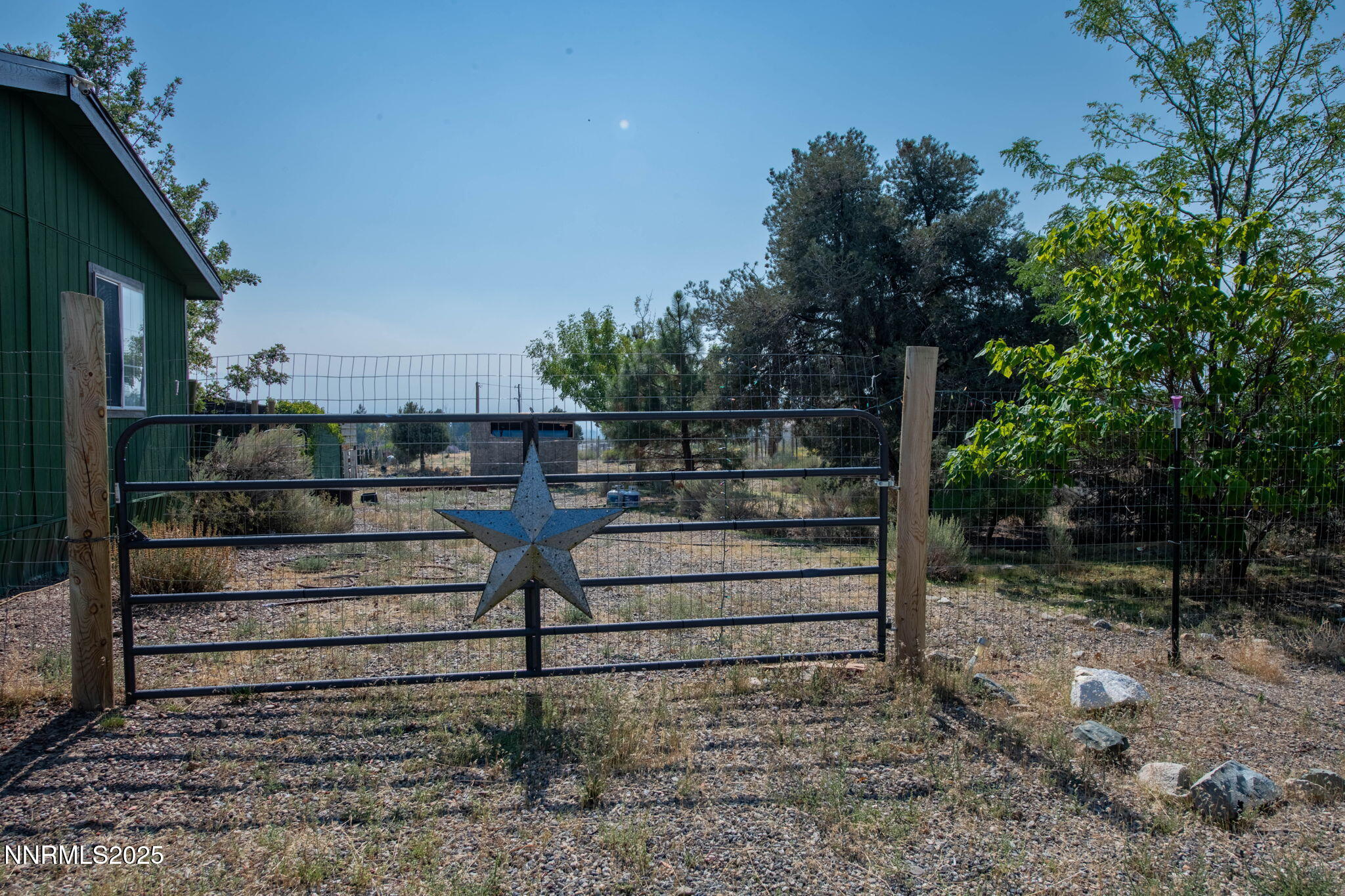 1535 Topaz Ranch Drive Topaz Ranch Estates, NV 89444 - Photo 32 of 38 a view of a bench in the backyard