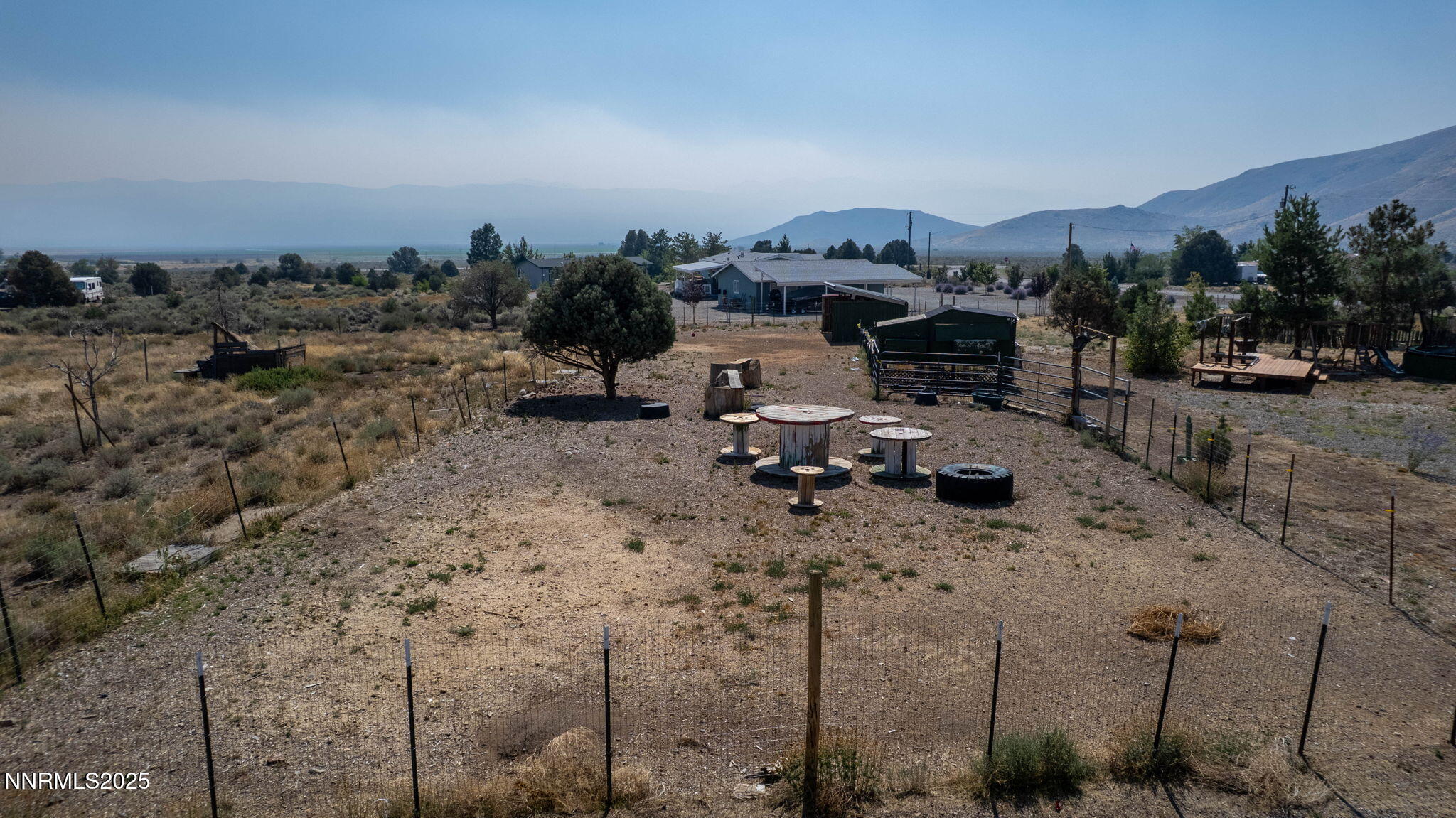 1535 Topaz Ranch Drive Topaz Ranch Estates, NV 89444 - Photo 36 of 38 a view of a terrace with lawn chairs