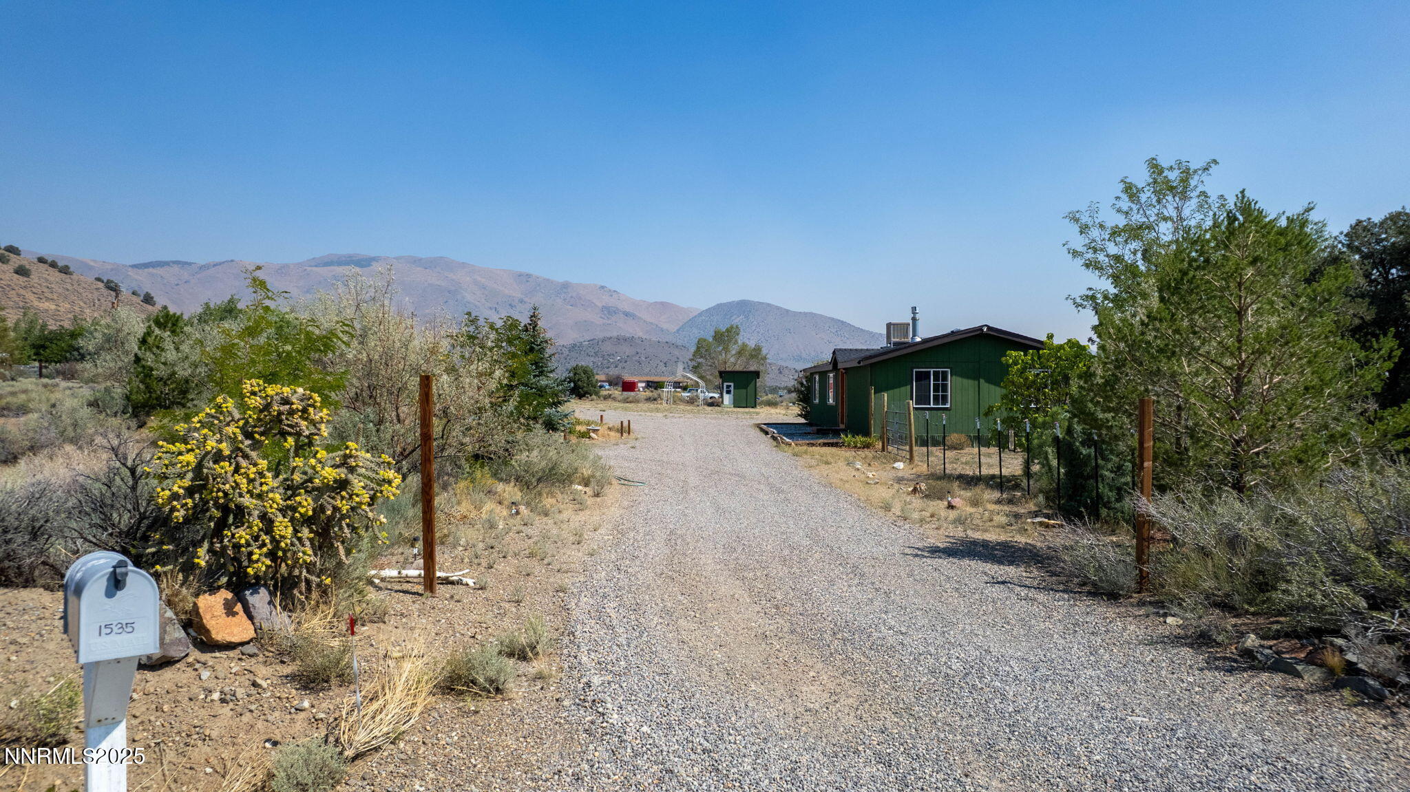 1535 Topaz Ranch Drive Topaz Ranch Estates, NV 89444 - Photo 38 of 38 a view of a town with mountains in the background