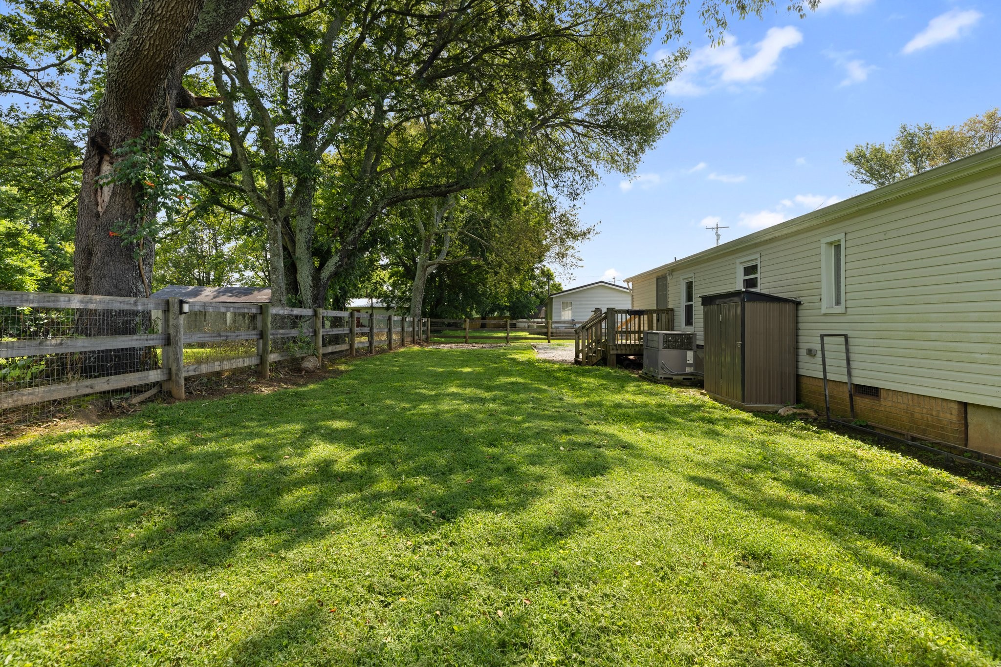 404 Broadview Street Chapel Hill, TN 37034 - Photo 21 of 21 a backyard of a house with table and chairs