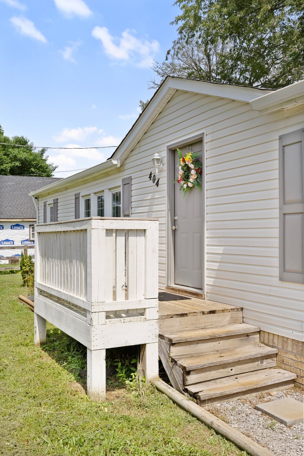 404 Broadview Street Chapel Hill, TN 37034 - Photo 3 of 21 a view of a house with wooden deck and a yard