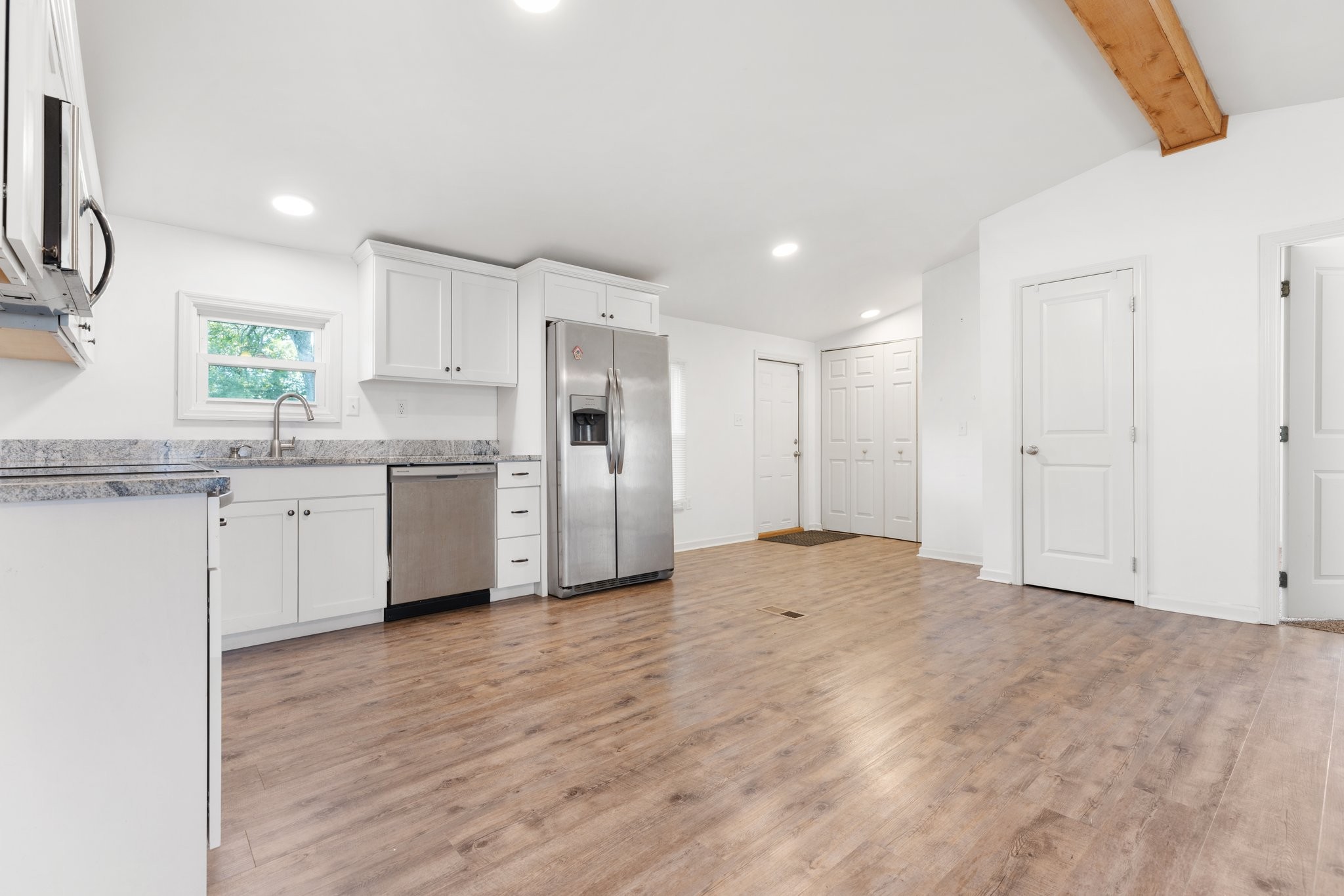 404 Broadview Street Chapel Hill, TN 37034 - Photo 5 of 21 a kitchen with stainless steel appliances granite countertop a stove a sink and a refrigerator