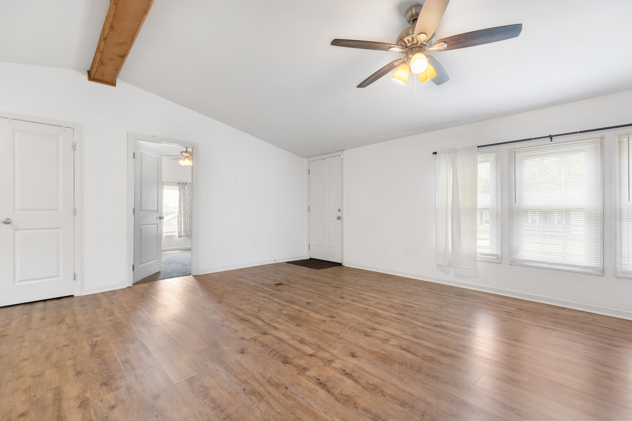 404 Broadview Street Chapel Hill, TN 37034 - Photo 10 of 21 wooden floor in an empty room with a window