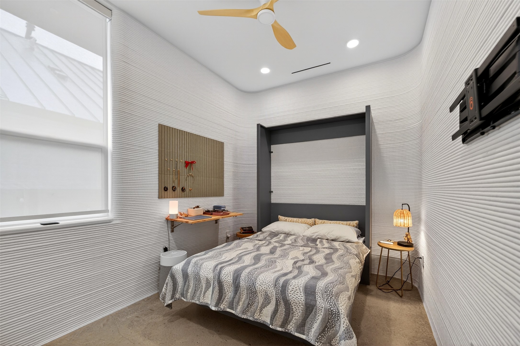 308 Painted Sunset Drive Georgetown, TX 78628 - Photo 15 of 26 Wall-mounted bed with dark gray frame