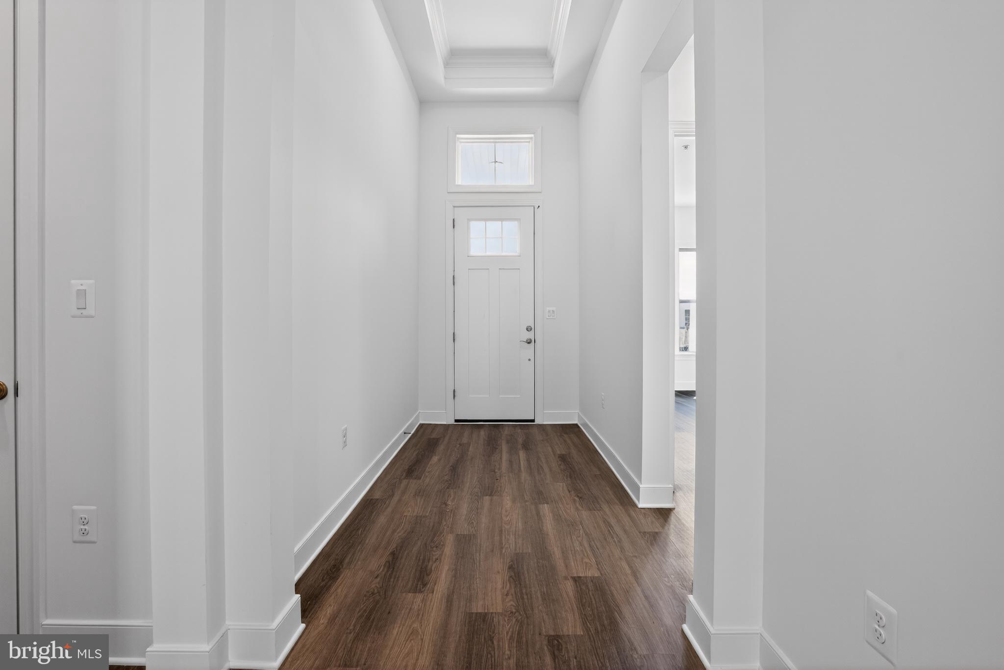 539 Warbler Way Chester, MD 21619 - Photo 2 of 51 a view of a hallway with wooden floor