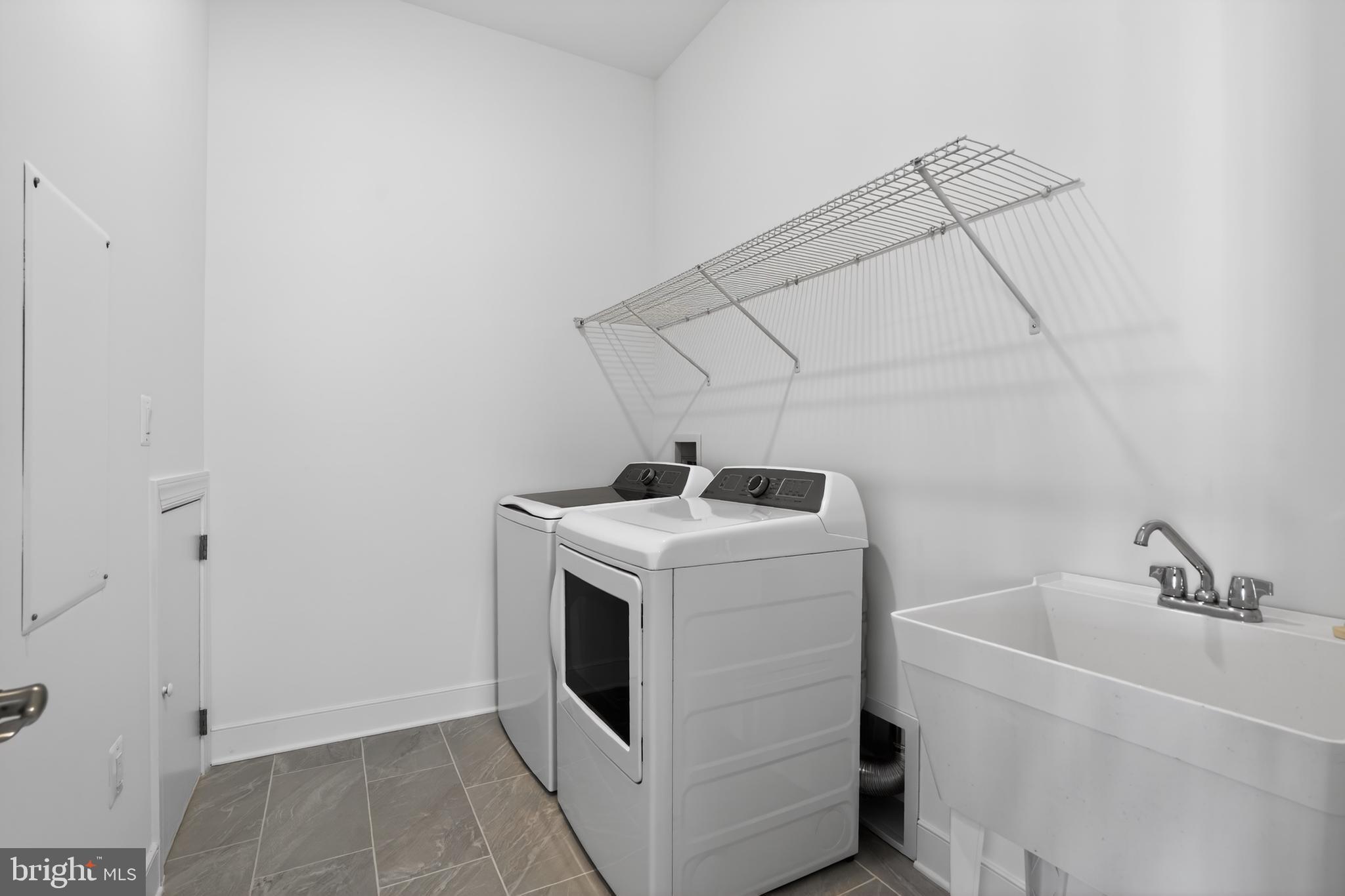 539 Warbler Way Chester, MD 21619 - Photo 23 of 51 a utility room with dryer and washer