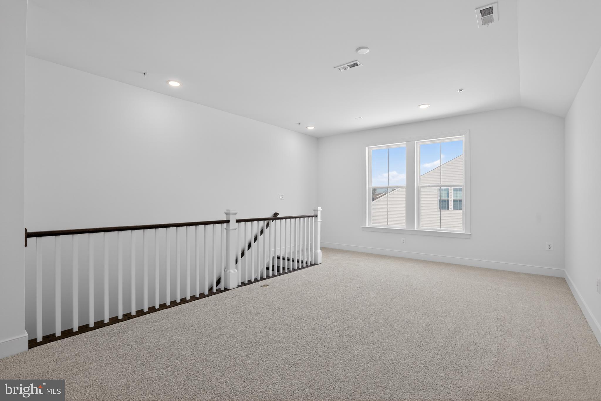 539 Warbler Way Chester, MD 21619 - Photo 24 of 51 a view of an empty room with a window