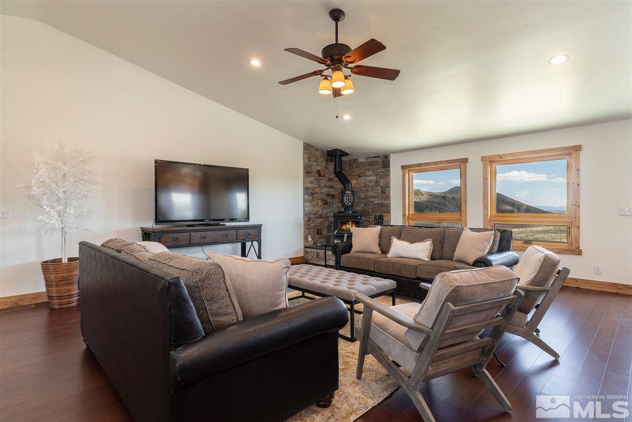 15000 North Red Rock Road Reno, NV 89508 - Photo 11 of 25 a living room with furniture and a flat screen tv