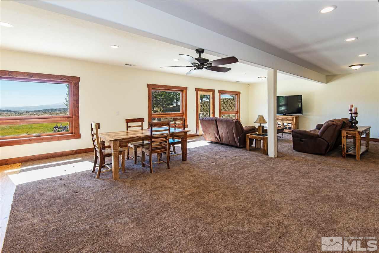 15000 North Red Rock Road Reno, NV 89508 - Photo 21 of 25 a view of a livingroom with furniture and a flat screen tv