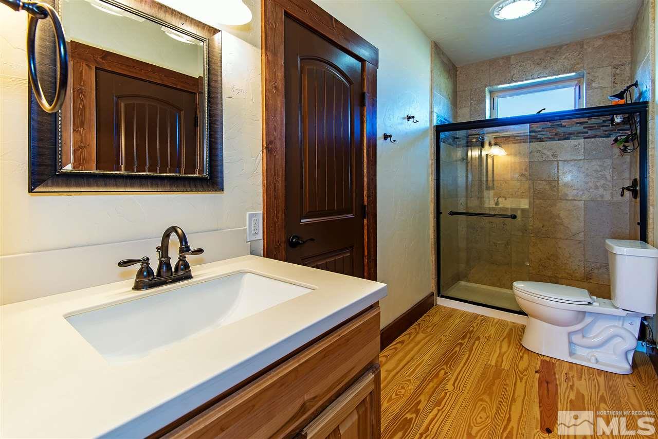 15000 North Red Rock Road Reno, NV 89508 - Photo 23 of 25 a bathroom with a sink and a mirror