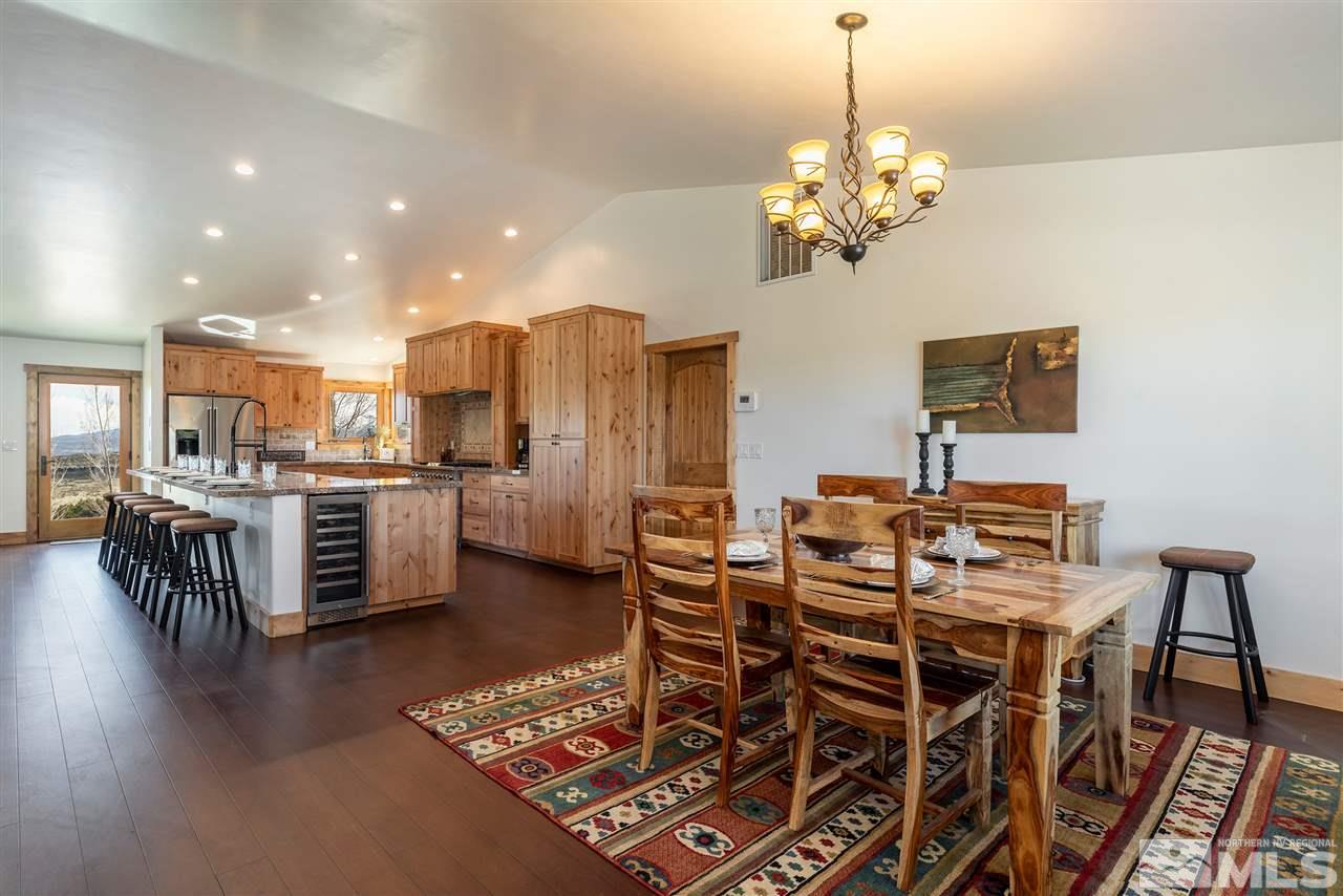 15000 North Red Rock Road Reno, NV 89508 - Photo 6 of 25 a view of a dining room with furniture and wooden floor