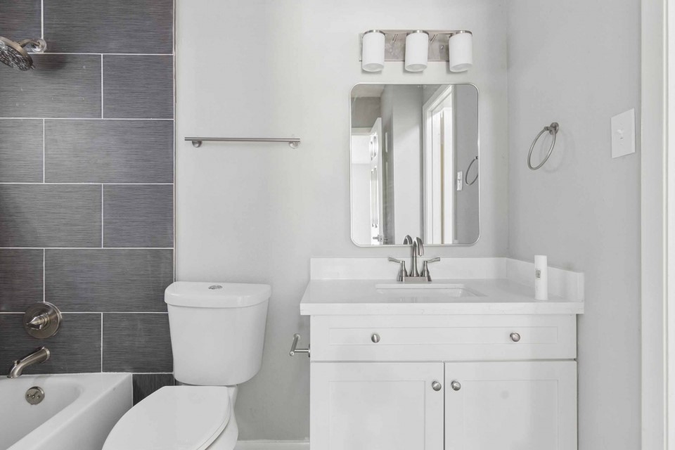7403 Strawbridge Lane Houston, TX 77040 - Photo 19 of 22 a bathroom with a sink toilet and shower