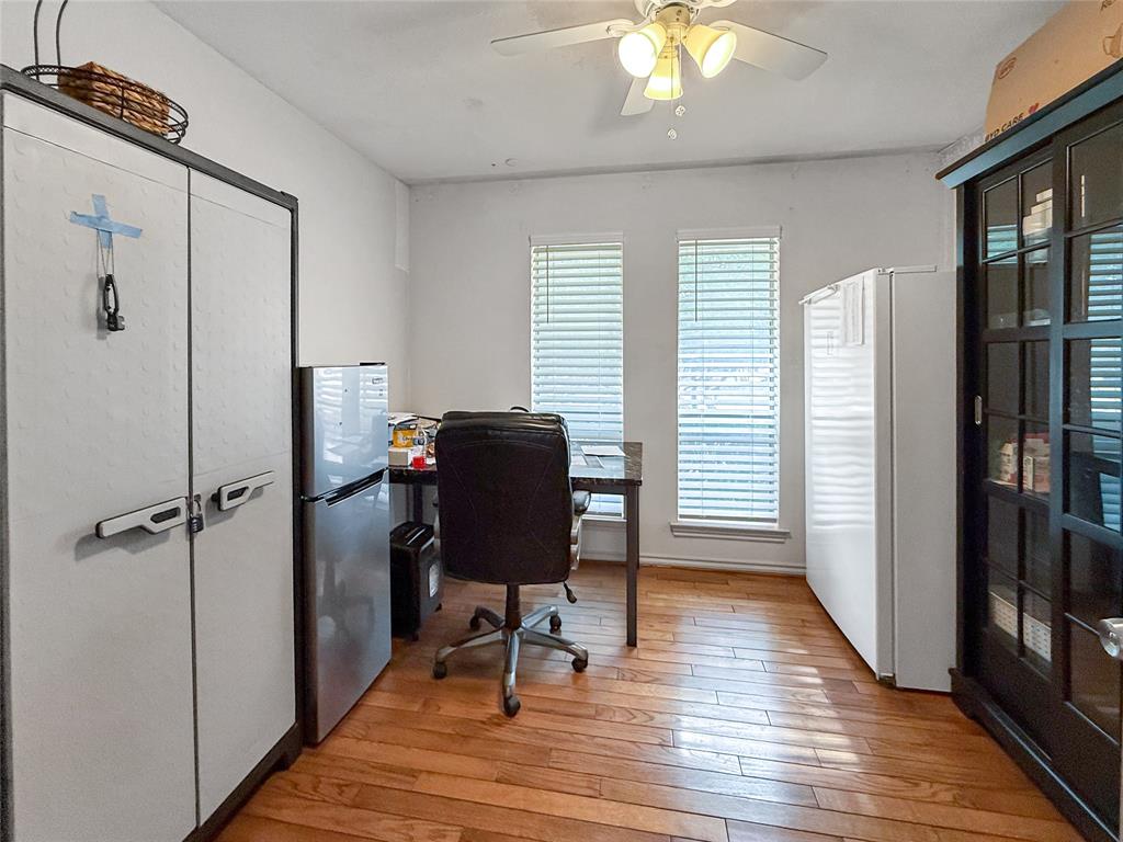 3109 Robin Road Plano, TX 75075 - Photo 11 of 34 a view of a workspace with furniture and a window