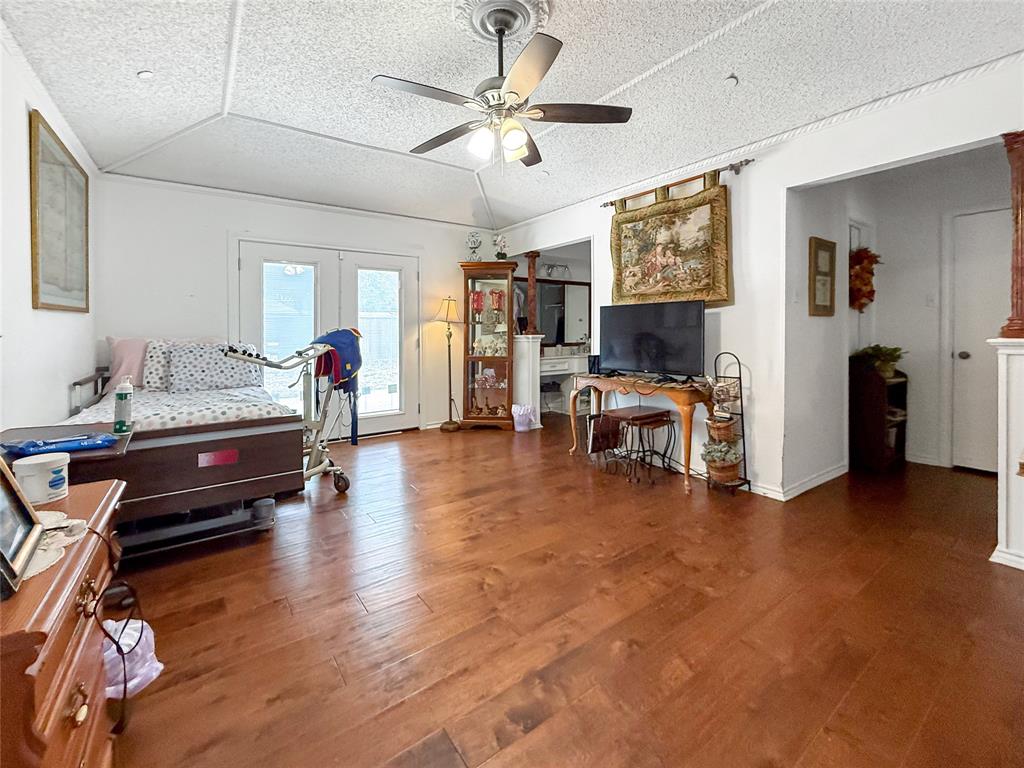 3109 Robin Road Plano, TX 75075 - Photo 17 of 34 a living room with furniture and wooden floor
