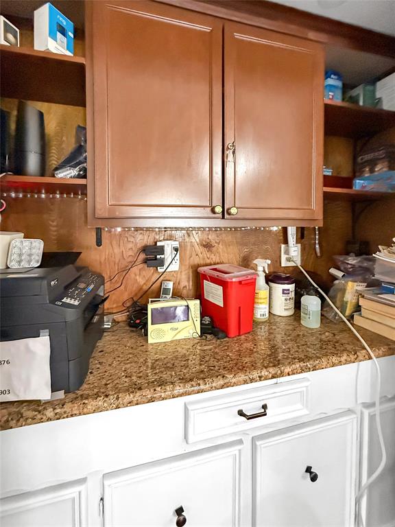 3109 Robin Road Plano, TX 75075 - Photo 21 of 34 a kitchen with sink a stove and a microwave oven