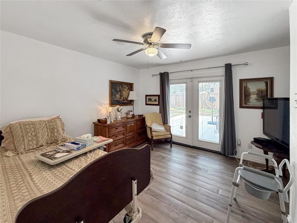 3109 Robin Road Plano, TX 75075 - Photo 23 of 34 a living room with furniture and a flat screen tv