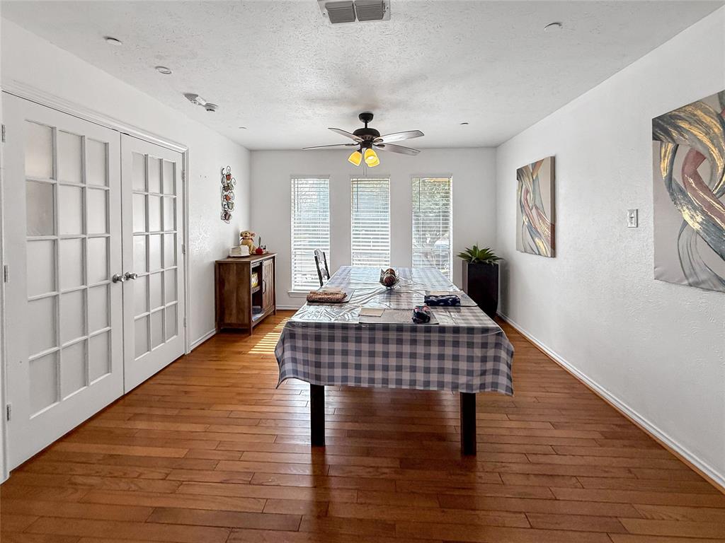 3109 Robin Road Plano, TX 75075 - Photo 4 of 34 a view of living room with furniture window and wooden floor