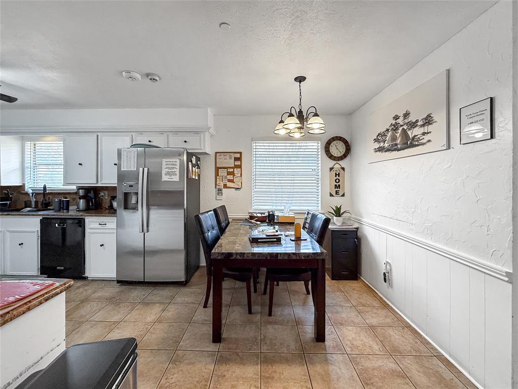 3109 Robin Road Plano, TX 75075 - Photo 10 of 34 a view of kitchen with furniture and refrigerator