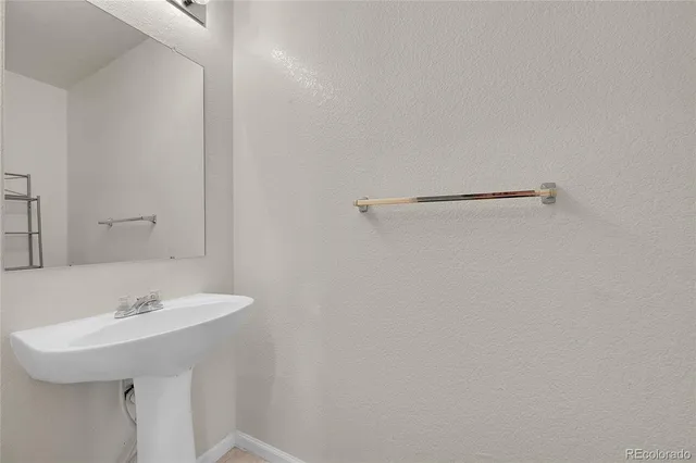 a view of a livingroom with wooden floor