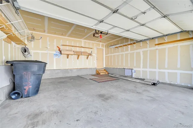 a view of a wooden chairs on the deck