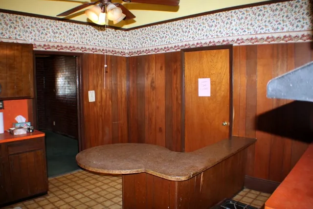 a bathroom with a sink toilet and mirror