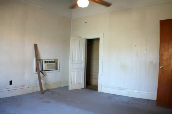 a view of a room that has a window