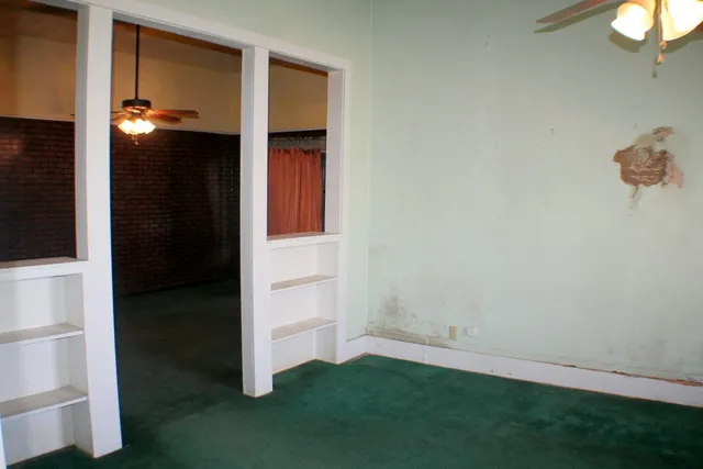 an empty room with closet