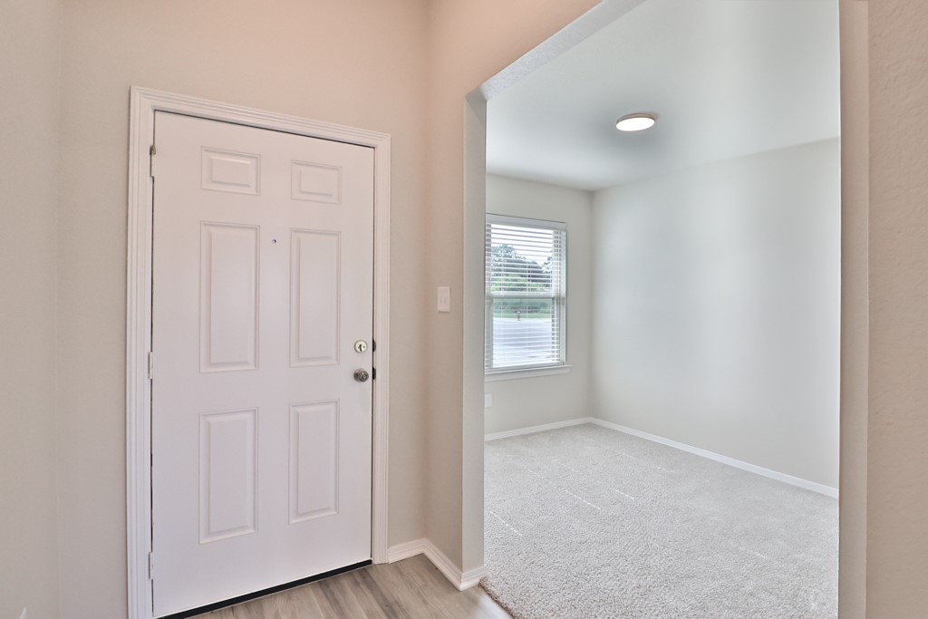 2871 Messenger Way Bryan, TX 77803 - Photo 6 of 13 an empty room with windows and closet