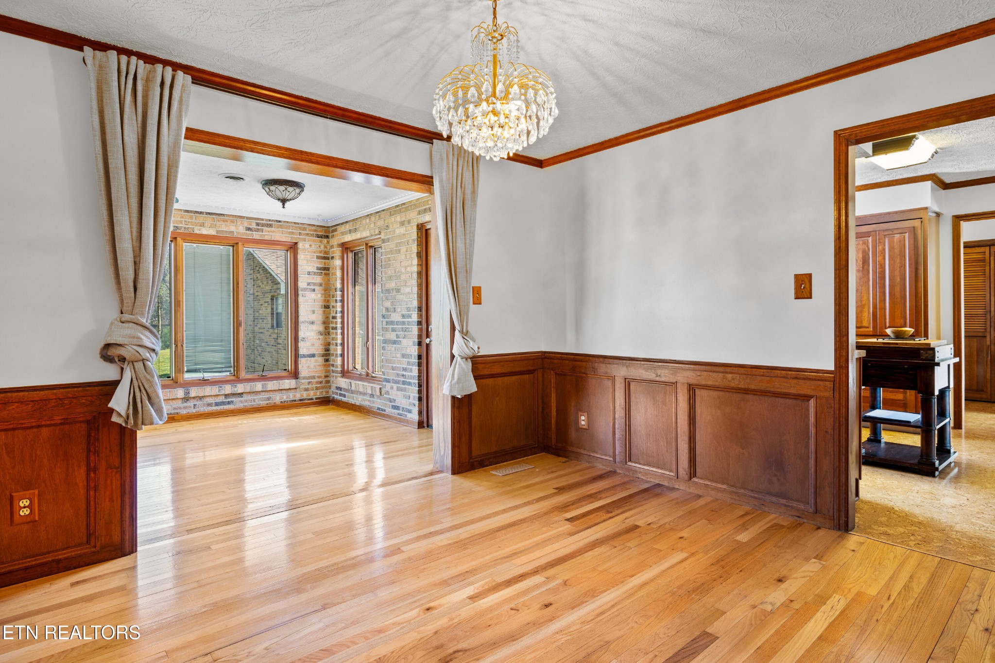 3941 Simpson Road Lenoir City, TN 37772 - Photo 17 of 35 a view of a hallway with wooden floor and staircase