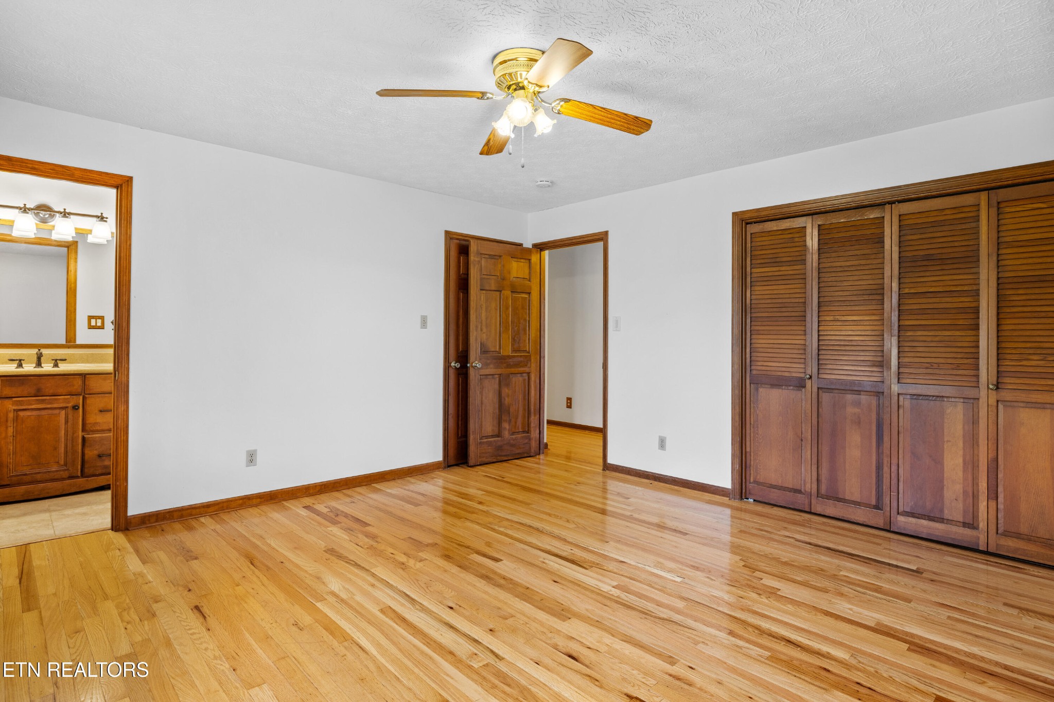 3941 Simpson Road Lenoir City, TN 37772 - Photo 19 of 35 a view of empty room with wooden floor