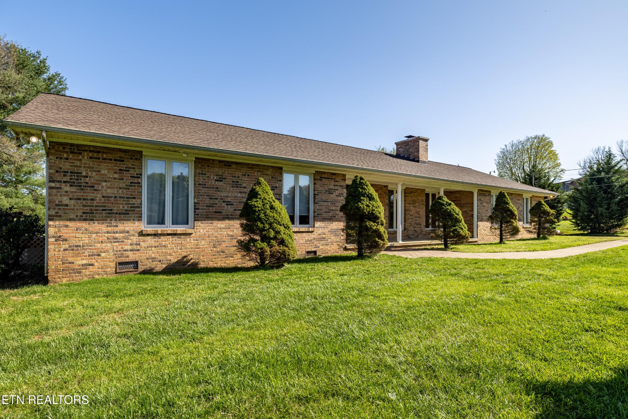 3941 Simpson Road Lenoir City, TN 37772 - Photo 2 of 35 a view of a house with a yard