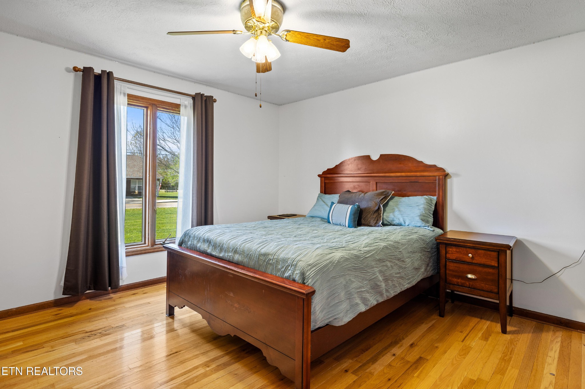 3941 Simpson Road Lenoir City, TN 37772 - Photo 22 of 35 a bedroom with a bed and window
