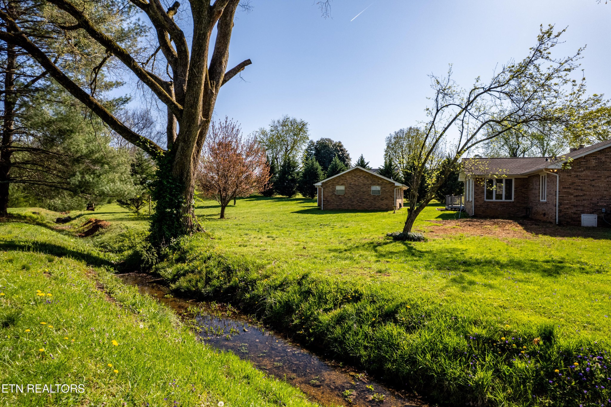 3941 Simpson Road Lenoir City, TN 37772 - Photo 26 of 35 a view of swimming pool with a garden