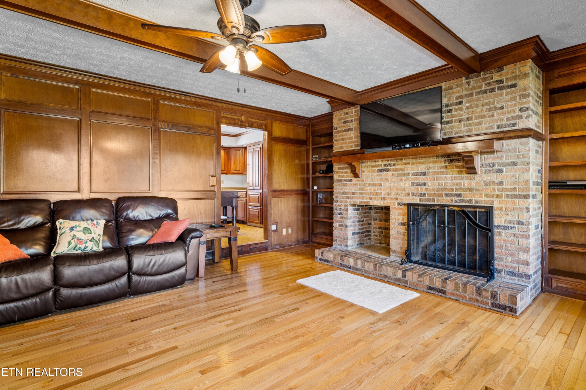 3941 Simpson Road Lenoir City, TN 37772 - Photo 8 of 35 a living room with furniture and a fireplace