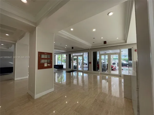 a view of a living room and dining room