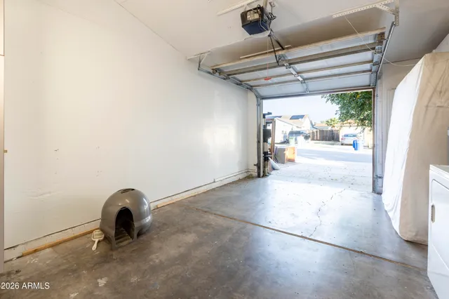 a view of a room with a sink and a dishwasher