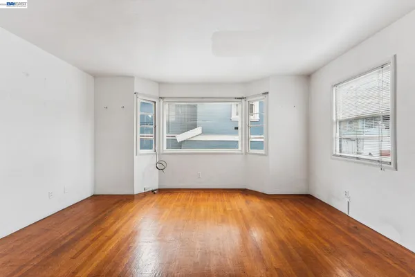 a kitchen with a sink and a refrigerator