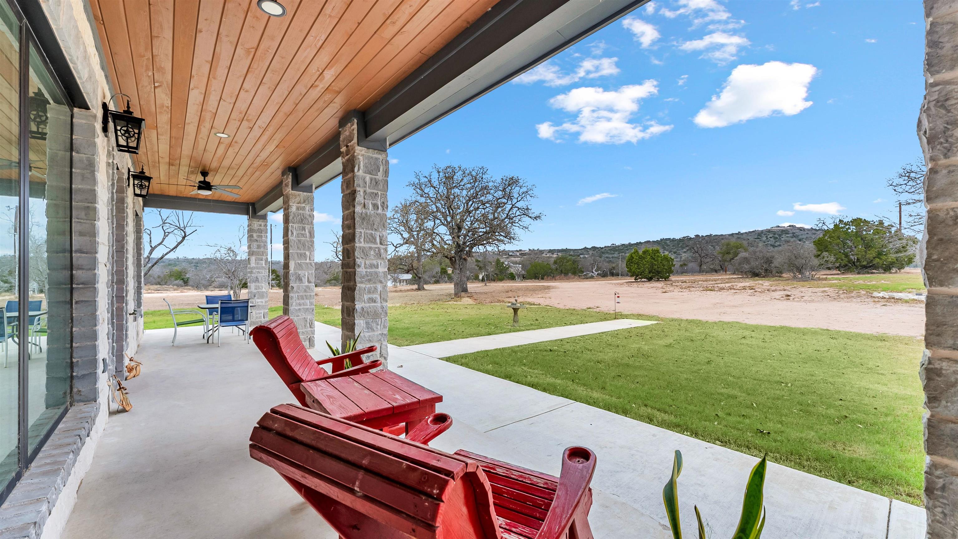 292 Oak Ridge Trail Kingsland, TX 78639 - Photo 6 of 29 a view of a two chairs in the park