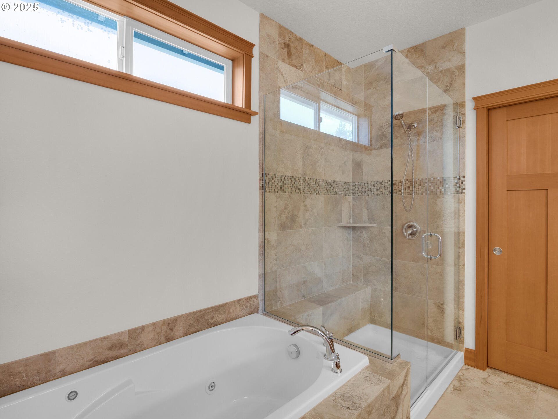 34535 Pinyon Drive Nehalem, OR 97131 - Photo 18 of 41 a bathroom with a bathtub and a shower