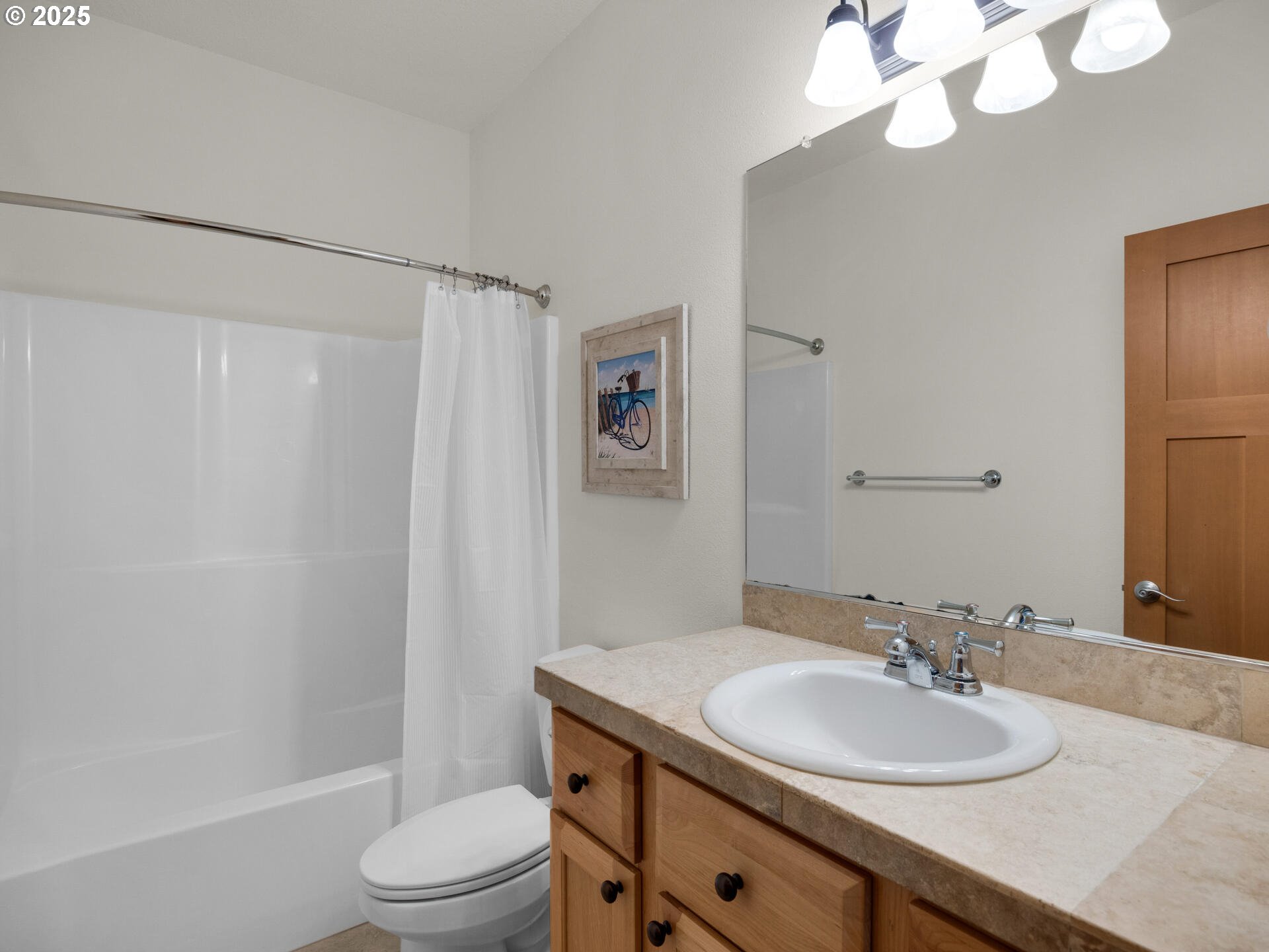 34535 Pinyon Drive Nehalem, OR 97131 - Photo 23 of 41 a bathroom with a sink a toilet a mirror and shower