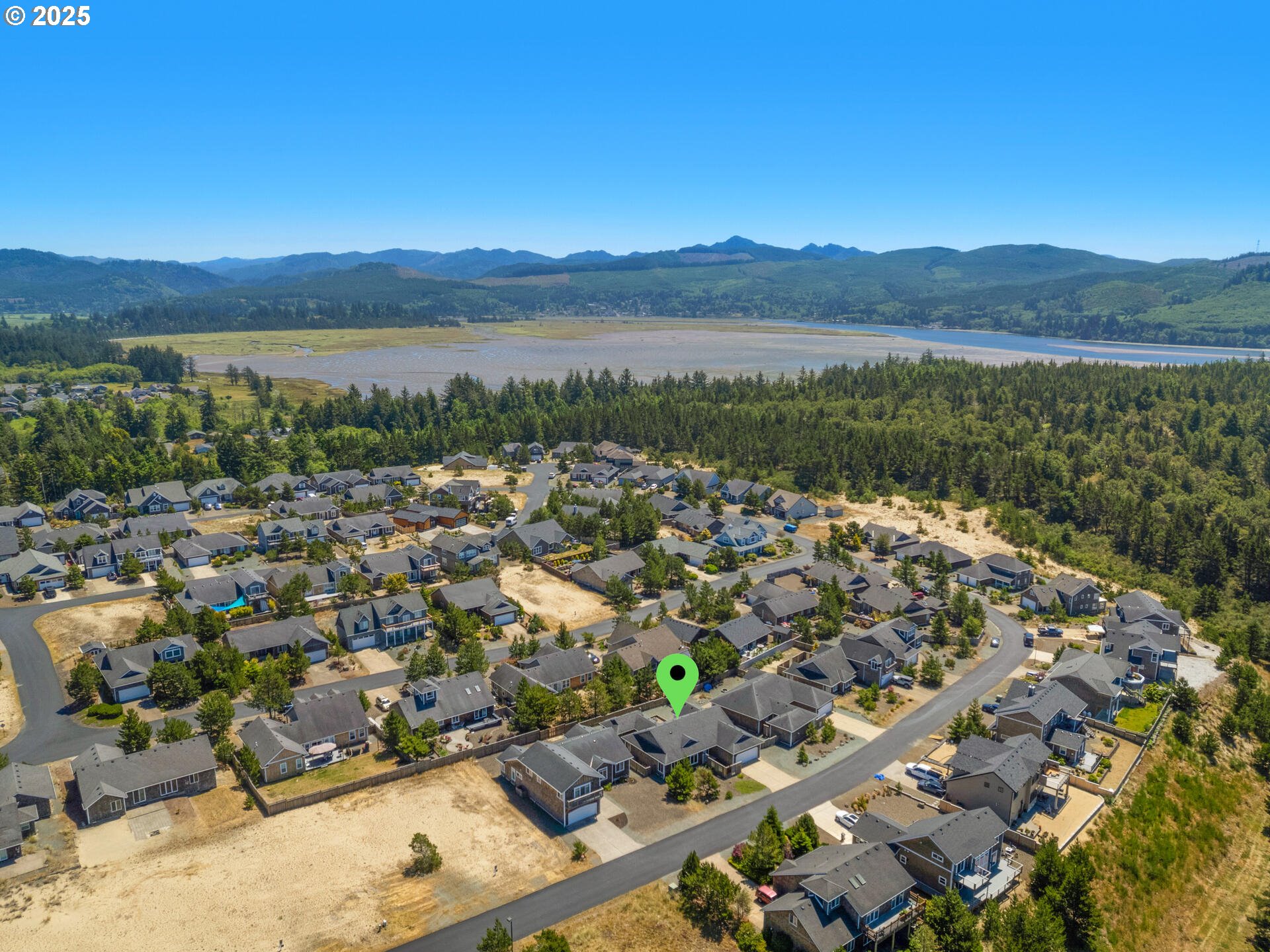 34535 Pinyon Drive Nehalem, OR 97131 - Photo 36 of 41 a view of a city with a lake