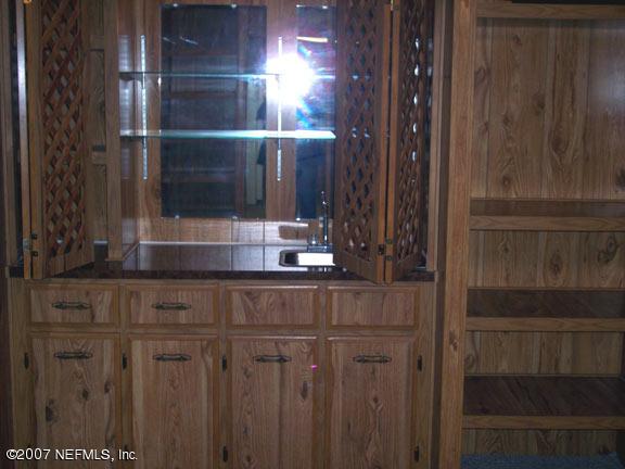 110 Bayberry Road Georgetown, FL 32139 - Photo 10 of 17 a bathroom with a sink and a mirror