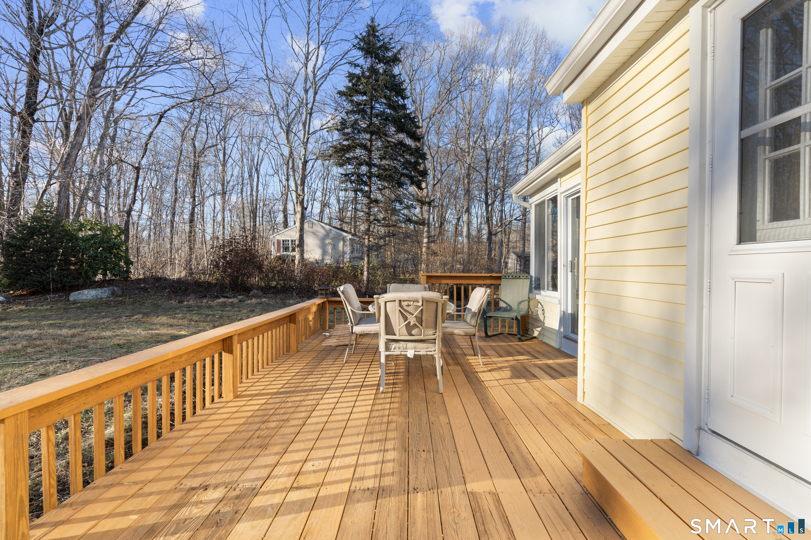 7 Coach Light Drive Clinton, CT 06413 - Photo 20 of 26 a balcony with wooden floor and furniture